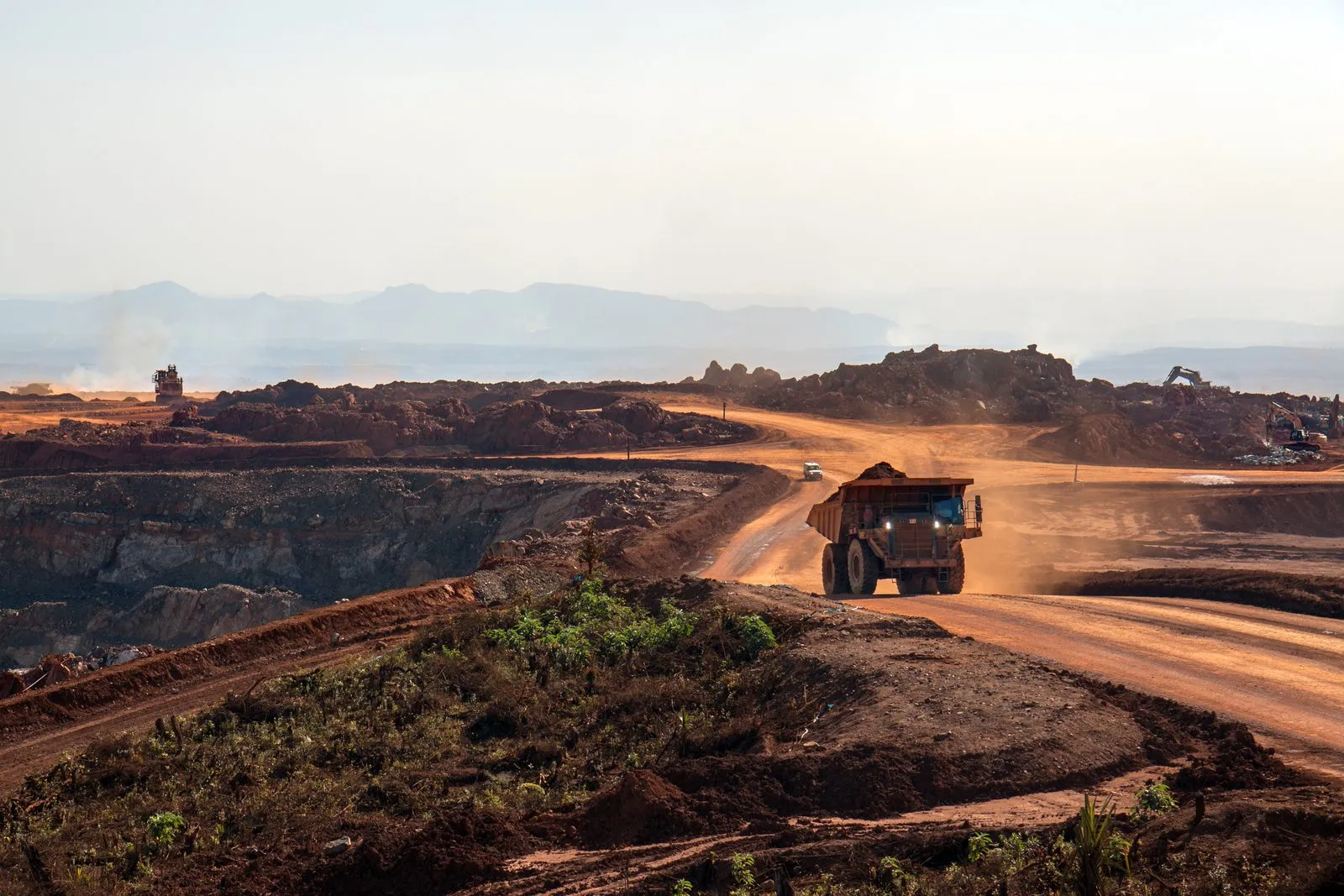 Dump truck on a haul road in an open-pit mine